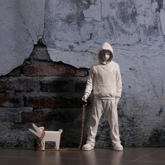 "Banksy" Inspired Man Playing With Dog